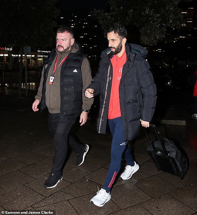 Rashford was nowhere to be seen as Ruben Amorim (right) and his players prepared for Spurs