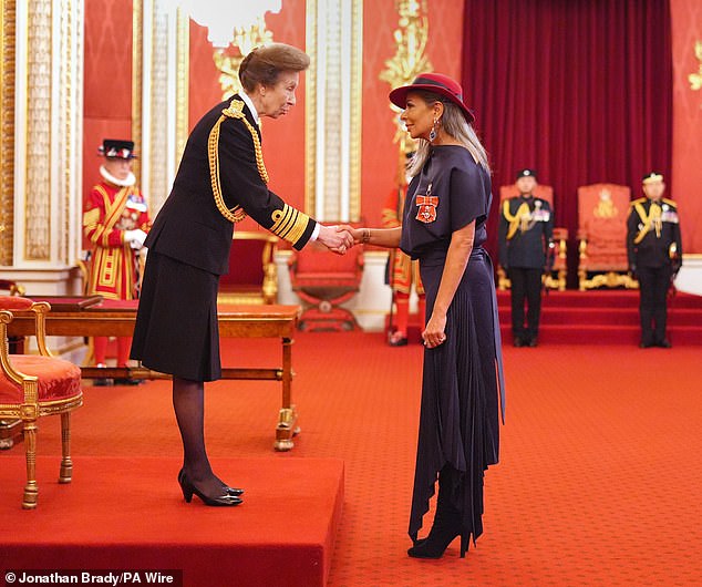 Shobna, who was awarded an MBE for services to the cultural industries, looked glamorous for the momentous day