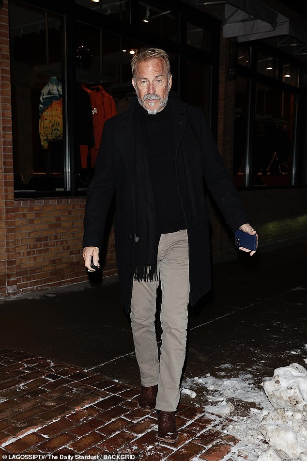 The star looked dapper in a black jacket and chinos ahead of Christmas in Colorado