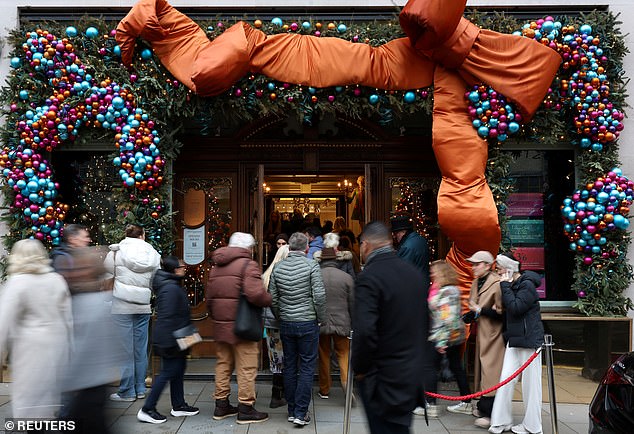 The photo shows shoppers entering the Fortnum and Mason store in London earlier this week