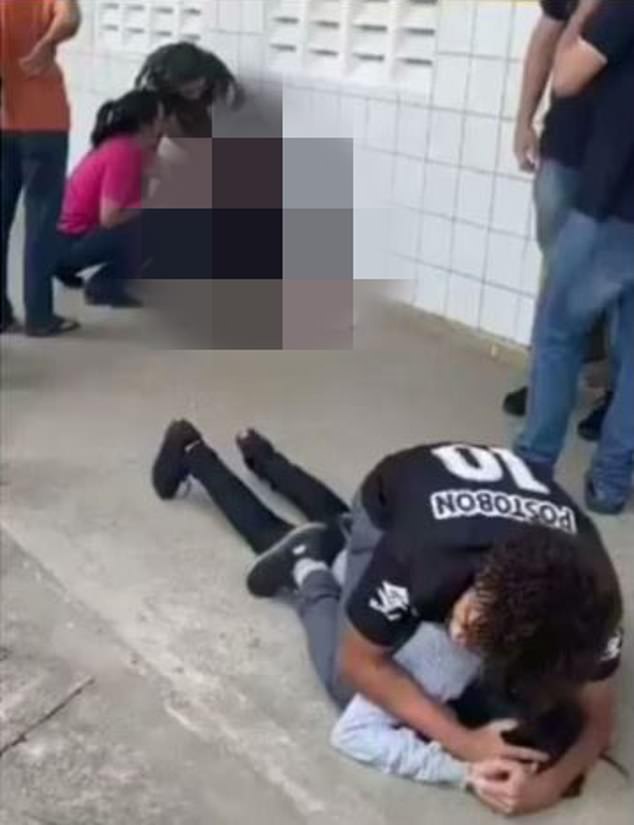 A student restrained Lyedja Santos (bottom right) while teachers tended to the injured classmate (top left) who was shot in the head by Santos