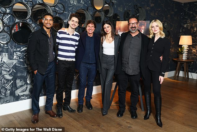 They also posed for group photos with the rest of the cast, including Monica Barbaro, Elle Fanning and director James Mangold; (L-R) Greg Tarzan Davis, Chalamet, Cruise, Barbaro, Mangold and Fanning