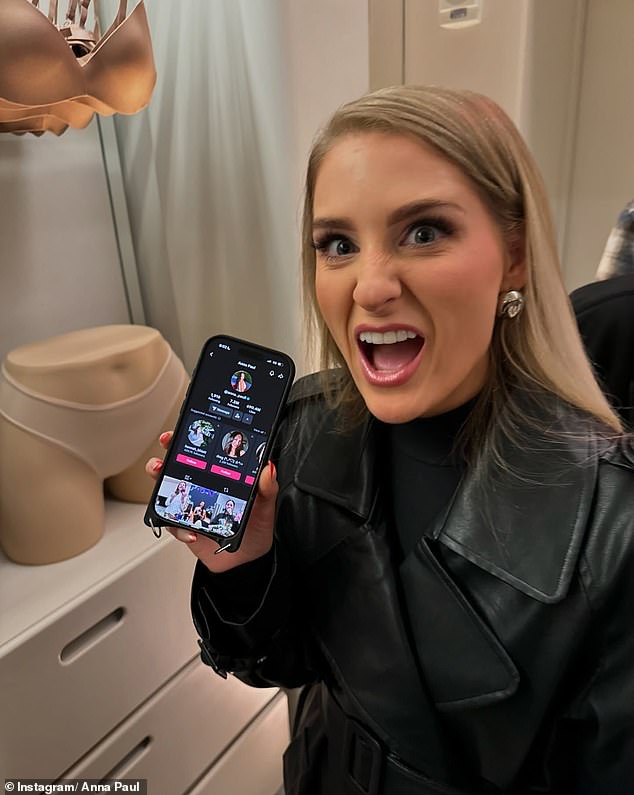 The social media star also shared a photo of singer Meghan Trainor, who wore a black leather trench coat and held up her phone with Anna's TikTok profile on the screen. Pictured