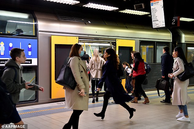 Commuters (pictured center) have been urged to check transport websites and apps to monitor updates to network disruptions