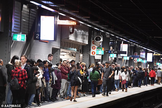 The union had previously planned to reduce the number of miles their members would travel to and from work (photo of commuters at Town Hall Station in Sydney)