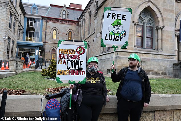 Protesters showed up outside the court Thursday in support of Mangione