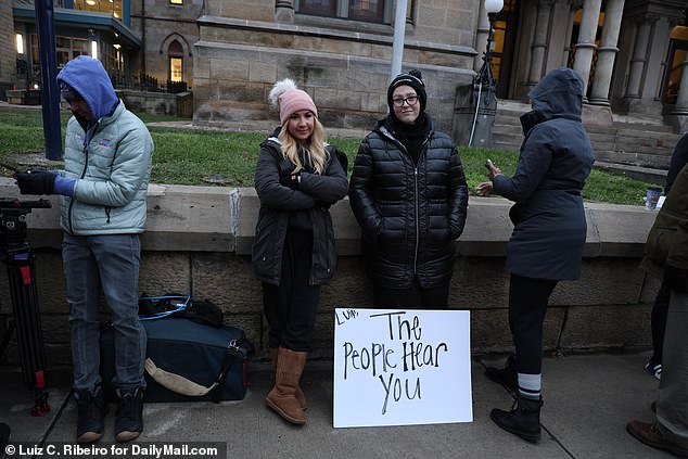 Supporters of Luigi Mangione line up outside the Blair County Courthouse complex in Hollidaysburg, Pennsylvania