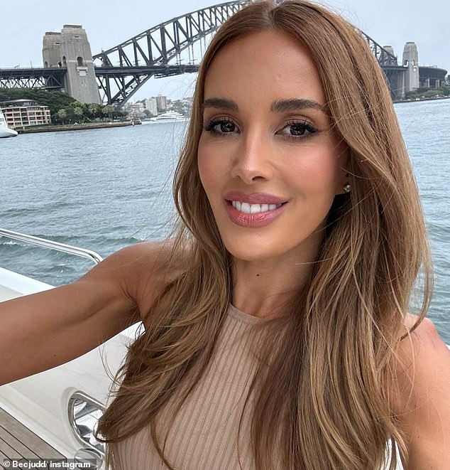 It was a beautiful summer day in Byron Bay on Thursday, but Rebecca Judd sent temperatures soaring further as she lay on the beach