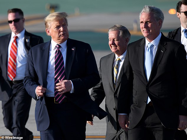 Speaker Mike Johnson got his job after eight Republicans rebelled against his predecessor, Kevin McCarthy (pictured above right with Trump), in 2023, repeatedly breaking the rules and sending spending monsters through the House of Representatives.