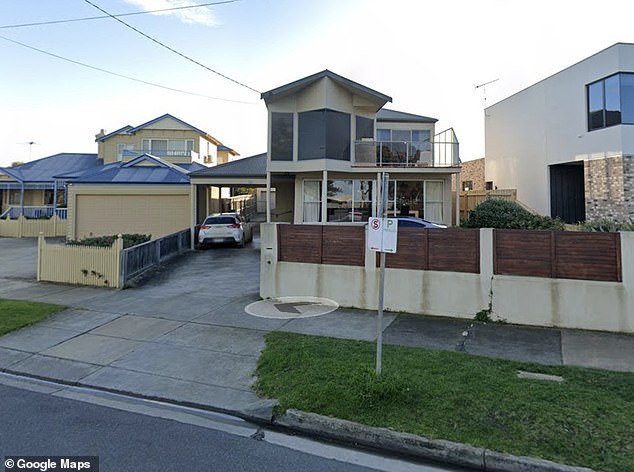 The $4 million, two-story, four-bedroom home (pictured) is just steps from Cozy Corner, a beach popular with families for its gentle waves