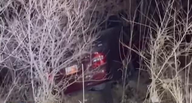 The couple had to swerve to avoid a piece of metal apparently left in the middle of the asphalt, and ended up in a ravine.