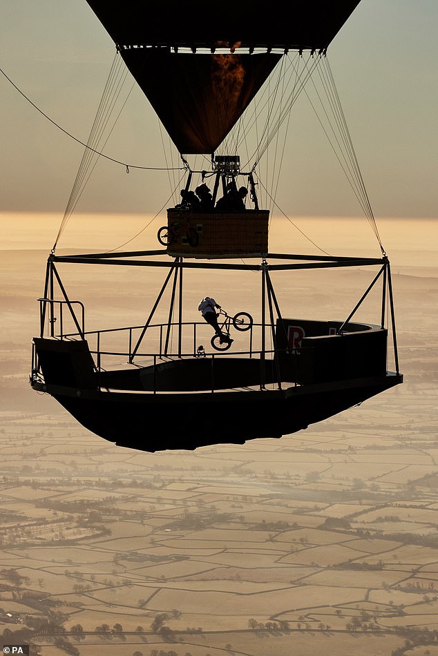 Kyle performs his routine of tricks on a floating skate park high above the Cotswolds