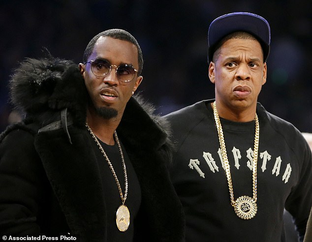 Rap moguls Sean 'Diddy' Combs, left, and Jay-Z attended the 2015 NBA All-Star basketball game together in New York