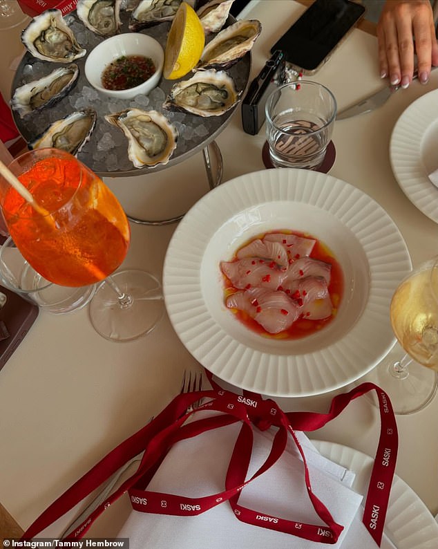 The Christmas lunch included a range of alcoholic drinks including wine and Aperol spritz, as well as delicious plates of oysters and sashimi