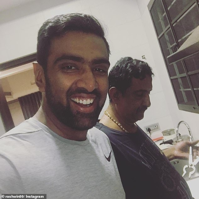 Ashwin's father (pictured right with the star) believes his son may have dropped out because of the 'humiliation' of not being selected