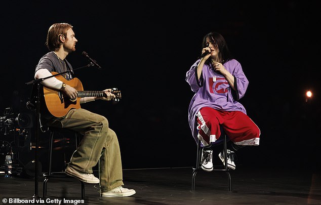 FINNEAS recently made a surprise appearance at Billie's Kia Forum stop in Los Angeles during the Hit Me Hard and Soft Tour; seen in December