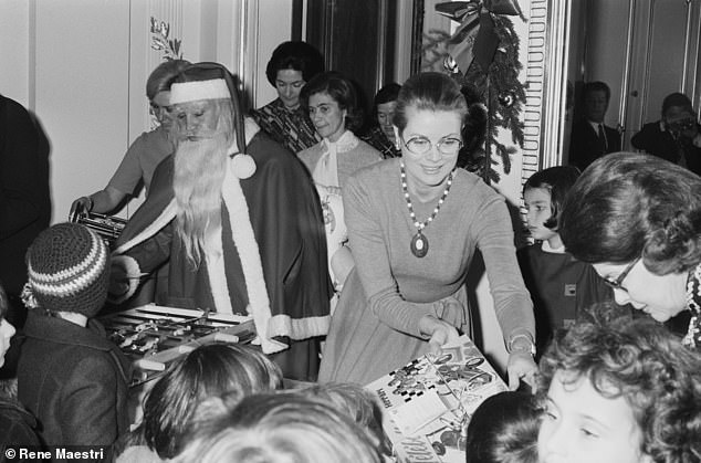 Princess Grace of Monaco handed out presents to children in 1973