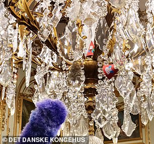 Elves hide in a chandelier