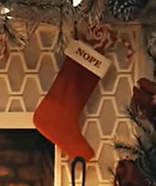 The 42-year-old singer posted a visualization for her project When Christmas Comes Around... Again on Wednesday. In the video, four red holiday stockings hang above a fireplace