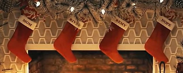 The stockings were complete with the names of each family member embroidered on them. One of them has the word 'No' monogrammed on it, which seems to refer to her ex