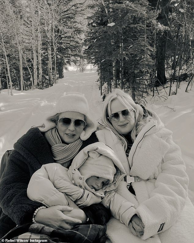 Another postcard perfect photo, showing the close-knit family happily huddled in the snow