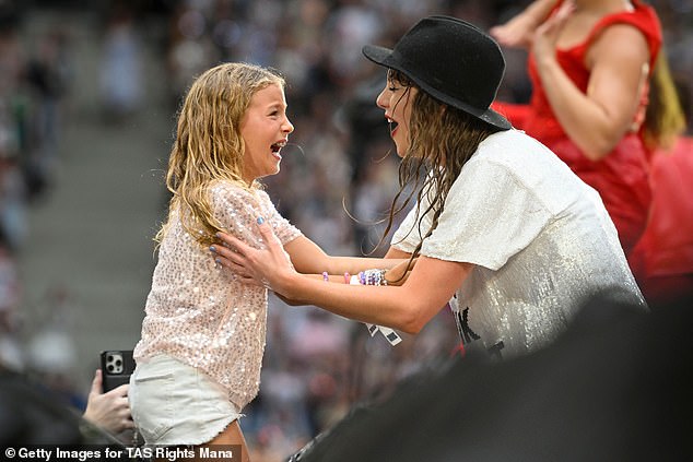 The hat looked exactly like the one she gave away to a lucky fan during her Red set at each tour stop (seen above on July 23, 2024 in Hamburg, Germany)