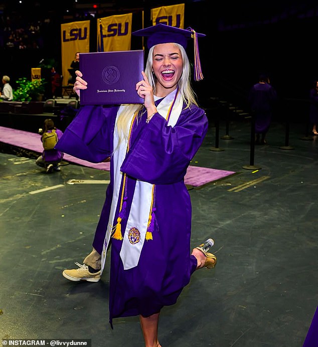 The gymnastics and social media star posed in her cap and gown as she received her diploma