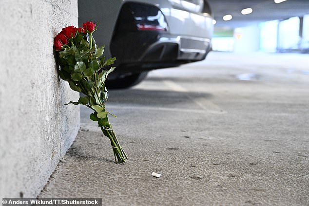 Flowers are left in the garage where Gaboro tragically died