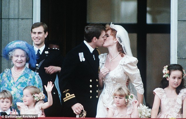 The couple shared a kiss on the balcony of Buckingham Palace on their wedding day in 1986