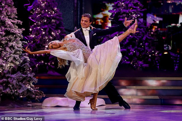 Meanwhile, Tamzin Outhwaite showed off her toned legs as she struck an impressive backbend, balancing on one foot while kicking her other leg high into the air.