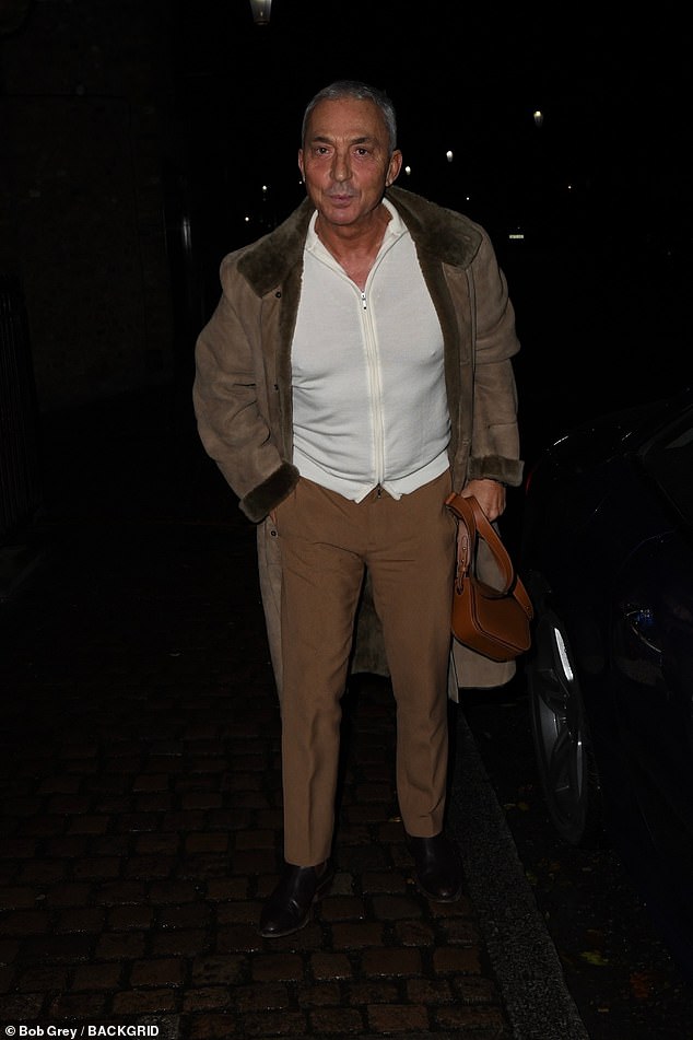 Bruno Tonioli looked dapper in brown trousers and a white zip-up jacket, complete with a fur jacket