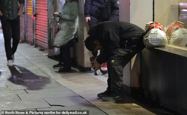 NEWCASTLE: It was all a bit too much for one reveler, who stares at the ground while holding what looks like a can of beer