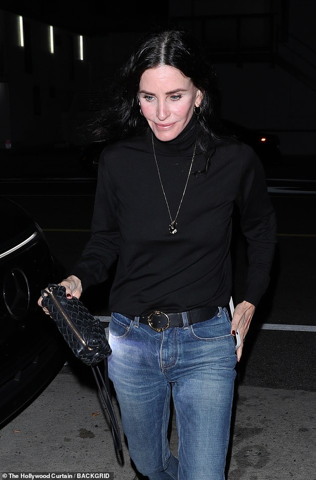 The Friends star wore minimal makeup to show off her ageless beauty as she donned a chic black sweater and jeans