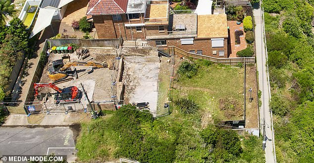 The sprawling six-bedroom, three-storey house that once stood on the site was completely demolished, leaving nothing but piles of stones and rubble to be hauled away by excavators.