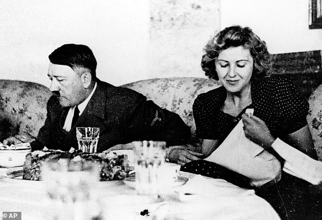 The last moments of Hitler and Braun, here dining together, have long been the subject of intense speculation among researchers and scholars.