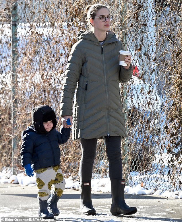 Jay later put a pair of thick gloves on her hands to help her stay warm in the cold winter temperatures