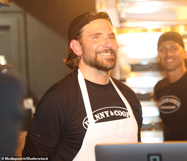 Danny & Coop's soft opening comes amid claims that the Victoria's Secret vet is 'in love' with The Hangover star and that 'their relationship is a huge priority for her'