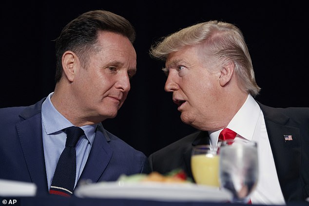 Mark Burnett (left) has described himself as 'Robin' to Donald Trump's (right) 'Batman'