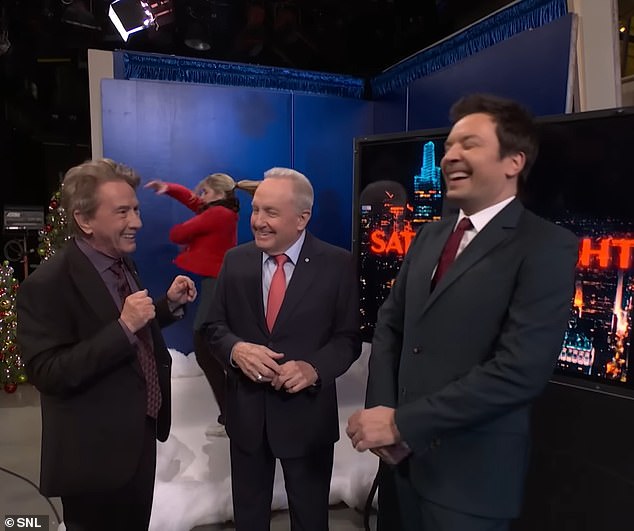 The jokes – which also almost made fun of AG Matt Gaetz and Robert F Kennedy – gave way to a satirical performance of the popular holiday song 'We Need a Little Christmas', and a surprise appearance from Lorne Michaels (centre) and Jimmy Fallon.