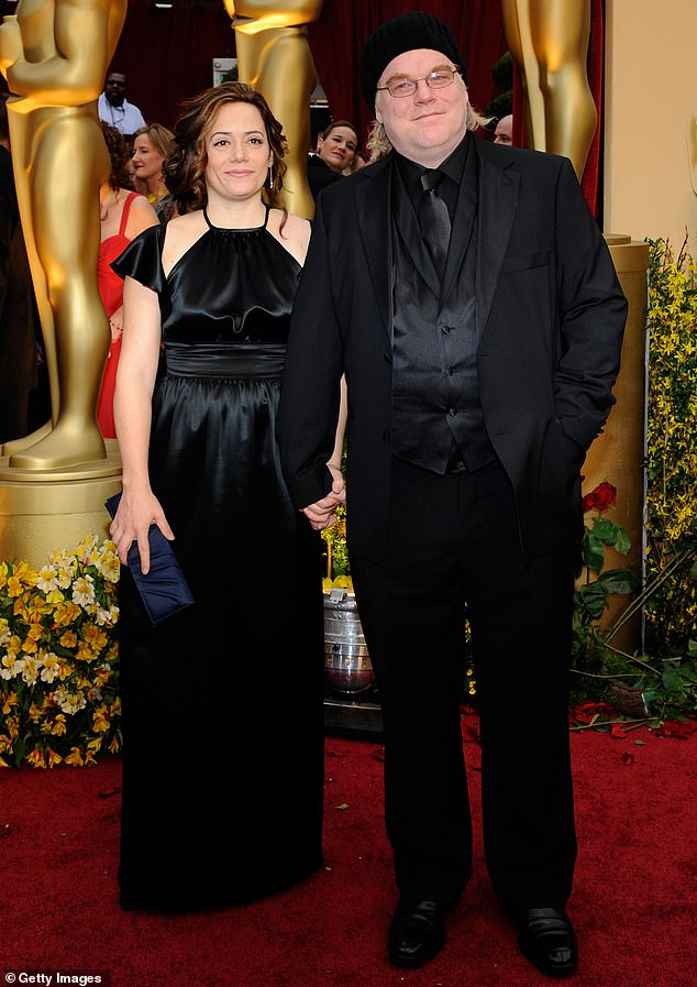 Although Hoffman kept a veil over his personal life, he was involved with costume designer Mimi O'Donnell from 1999 until his death; they are pictured in 2009