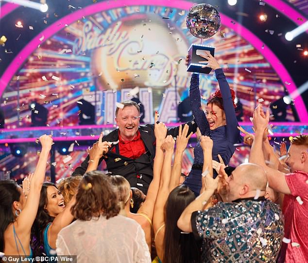 Chris and Dianne couldn't contain their excitement as they triumphantly lifted the Glitterball Trophy