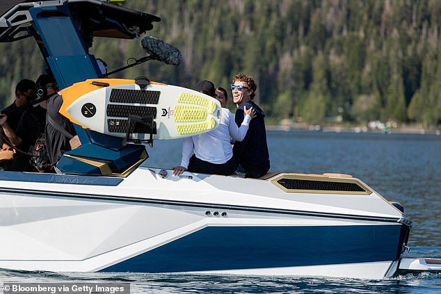 Zuckerberg, Chang and Chan took off on a boat to go surfing in the lake. The billionaire said it is important to have hobbies outside of academia