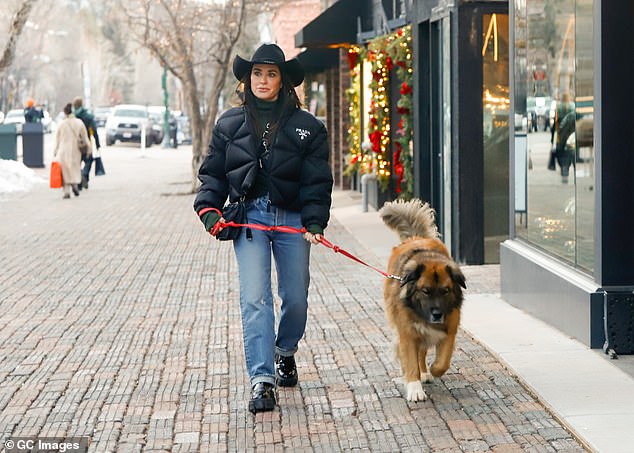 Despite reportedly being 'heartbroken' over the new romance, Kyle put on a brave face as she strolled around the Colorado getaway and even walked her dog around the quaint town.