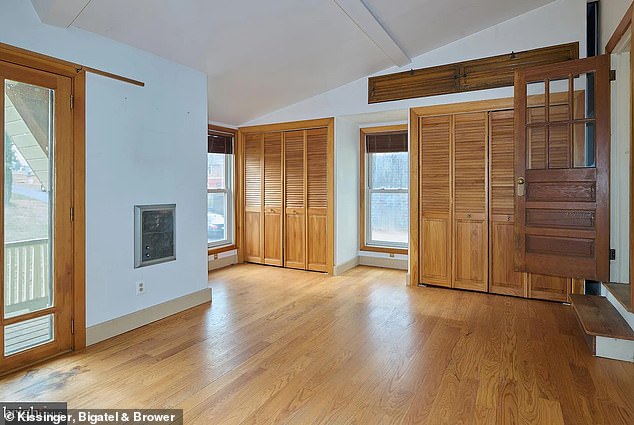 Upstairs, two bedrooms are connected via the driveway to the other side of the house