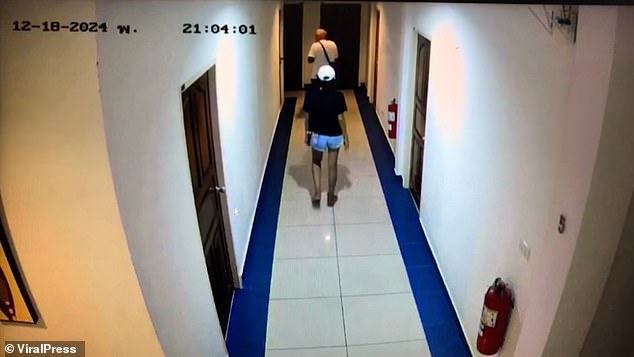 CCTV footage obtained by police shows the Duangta in a black shirt and white cap walking with the tourist along the hotel corridor on the evening of December 18