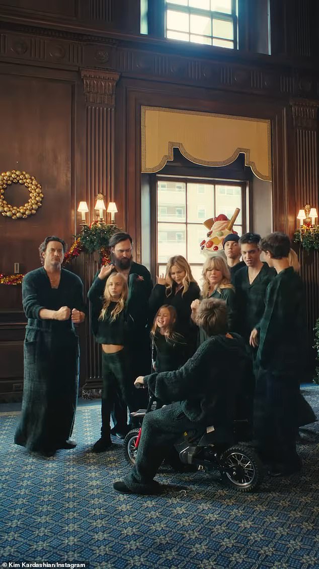 The ad, filmed in a lavish mansion, features the Hudson-Hawn clan rocking SKIMS pajamas as they demolish a decadent holiday meal served to them by a butler.