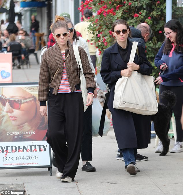 The sisters were joined by their mother Kathleen McNulty Mara and it's clear where Kate, 41, and Rooney, 39, get their looks from