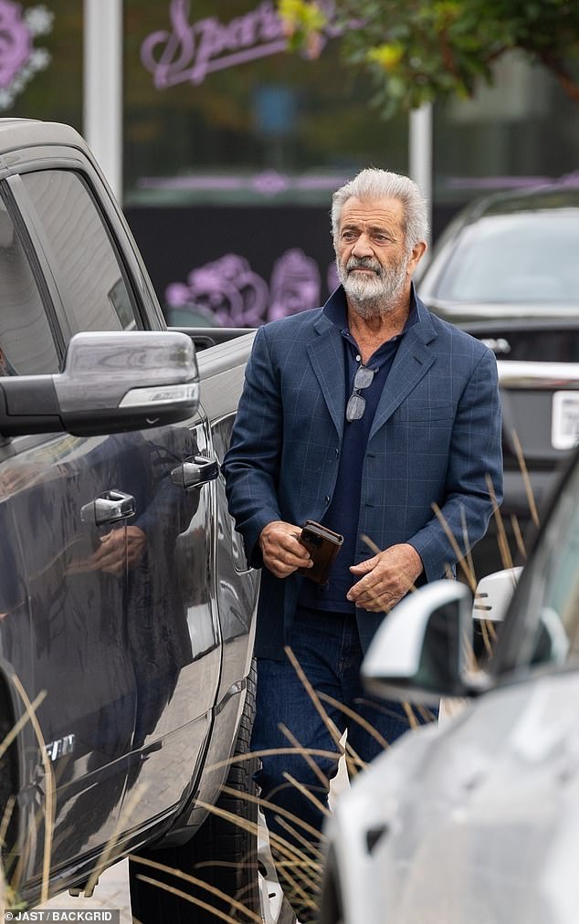 He showed off his bushy gray beard during the outing, while his hair was a bit messy during the grocery trip