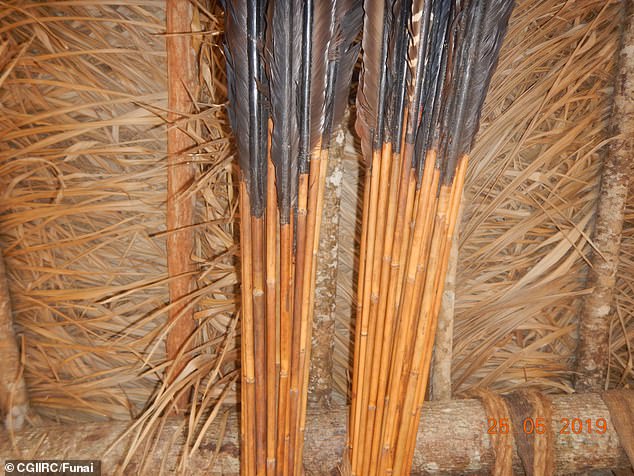 The Massaco tribe hunts for food with three-meter-long bows and moves their villages from season to season