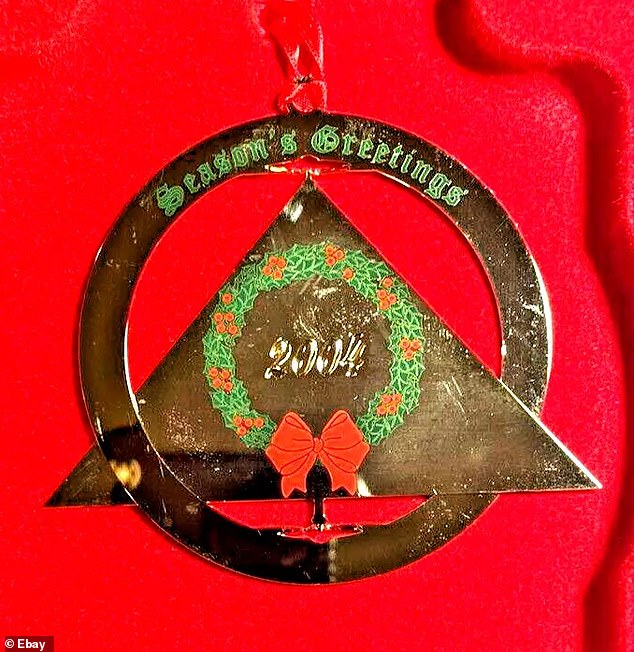 This 2004 NSA ornament features a seasonal wreath on the back (above)